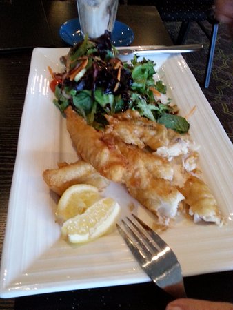 Restaurant At D'Olive Quality Suites - Dentist Find 0